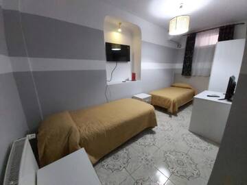 Фото номера Двухместный номер с 2 отдельными кроватями Гостевой дом B&amp;B Casa Italia г. Тимишоара 2
