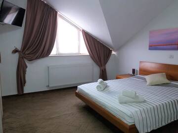 Фото номера Улучшенный двухместный номер с 1 кроватью Отель Hotel Veneto г. Тимишоара 6