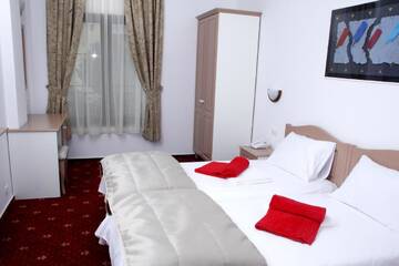Фото номера Двухместный номер с 2 отдельными кроватями Отель Hotel Exclusiv г. Тимишоара 4