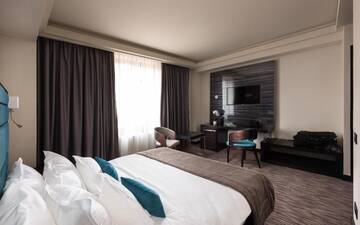 Фото номера Двухместный номер Делюкс с 1 кроватью Отель Old Town Hotel г. Тимишоара 8