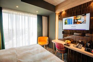 Фото номера Стандартный номер с кроватью размера &quot;king-size&quot; Отель Mercure Timisoara г. Тимишоара 8