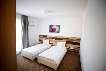 Фото номера Двухместный номер с 1 кроватью Апарт-отели 1Hotels г. Тимишоара 2