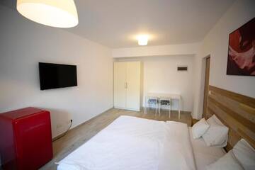 Фото номера Двухместный номер с 1 кроватью и кухней Апарт-отели 1Hotels г. Тимишоара 6