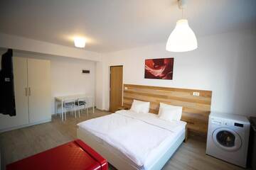 Фото номера Двухместный номер с 1 кроватью и кухней Апарт-отели 1Hotels г. Тимишоара 7