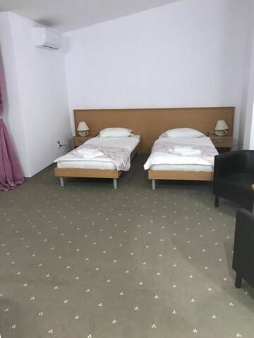 Фото номера Стандартный двухместный номер с 2 отдельными кроватями Отель Hotel Vandia г. Тимишоара 21