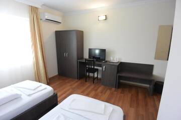 Фото номера Двухместный номер с 1 кроватью или 2 отдельными кроватями Отель Hotel Arizona г. Тимишоара 12