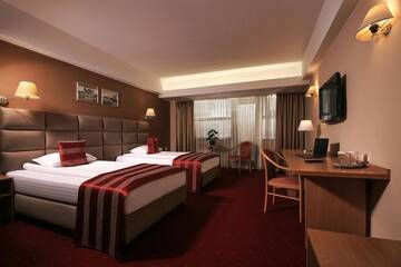 Фото номера Двухместный номер с 2 отдельными кроватями Отель Reghina Blue Hotel г. Тимишоара 3