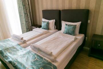 Фото номера Двухместный номер с 2 отдельными кроватями Гостевой дом May Residence г. Тимишоара 12