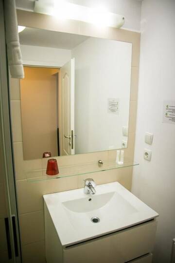 Фото номера Двухместный номер с 2 отдельными кроватями Гостевой дом May Residence г. Тимишоара 14