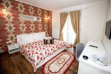 Фото номера Стандартный двухместный номер с 1 кроватью Отель Hotel Ramina г. Тимишоара 16