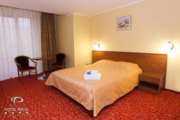 Фото номера Полулюкс (для 2 взрослых и 2 детей) Отель Hotel Perla г. Тимишоара 4
