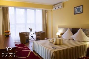Фото номера Двухместный номер с 1 кроватью Отель Hotel Perla г. Тимишоара 12